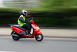 scooter rouge roulant