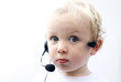 Foto: young boy wearing telephone headset young boy wearing telephone headset