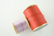 orange-red and purple thread
