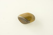 brown colored gem like stone