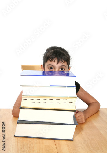 Photo: girl behind books girl behind books