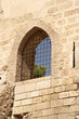 window of ancient tower of castle santa barbara