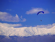 paraglider flying over macedonia paraglider flying over macedonia