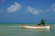 Foto: fisherman in its boat, during an afternoon end fisherman in its boat, during an afternoon end