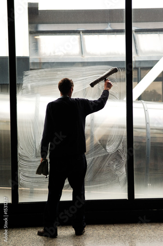 Photo: cleaning the windows at the airport cleaning the windows at the airport