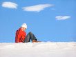 girl sitting on snow