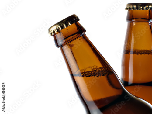 upper part of two beer bottles