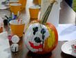 painted pumpkin with yellow cups painted pumpkin with yellow cups