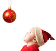 christmas child in a red hat