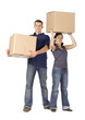 house renovation - couple carrying boxes