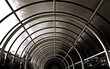 circular arch tunnel of metal and windows