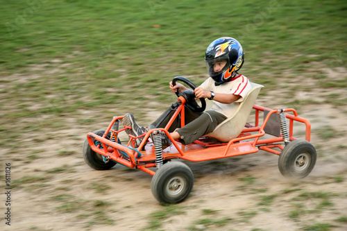 Photo: a boy rides kart a boy rides kart