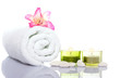 gladiola,white towel,candles and white river stones gladiola,white towel,candles and white river stones
