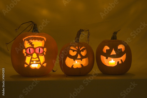 Photo: three jack-o-lanterns three jack-o-lanterns