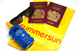 Images : holiday brochure,sun cream,passports and sun glass
