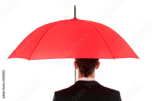 businessman holding an umbrella
