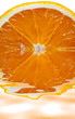 sliced orange isolated on white background with re