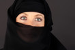 attractive woman covered by a veil