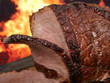 english roast meat by fire with flames