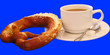 Foto: kaffetasse mit breze kaffetasse mit breze