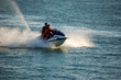 woman and man on a jetski