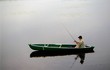 photo pêcheur dans un bateau