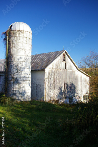 Photo: abandoned barn and silo abandoned barn and silo