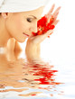 Foto: lady with red petals in water lady with red petals in water