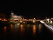 paris bridge at night