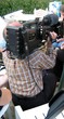 photographer taking photo in tv show/programme