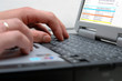 man's hands on the keyboard of laptop man's hands on the keyboard of laptop