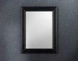 empty frame against textured wall