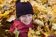 boy playing in the foliage