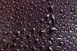 water drops of condensation on a bottle of soda