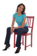 young woman sitting on chair young woman sitting on chair