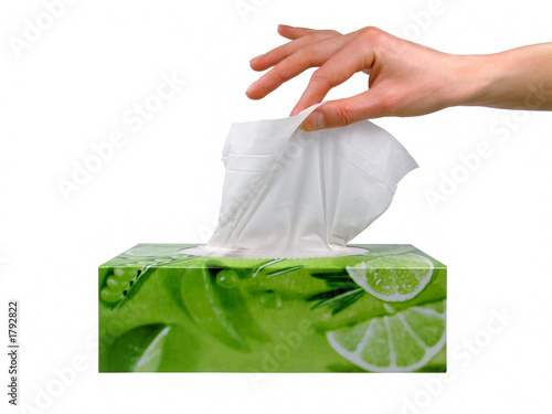 female hand taking a tissue from a box