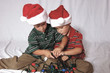 boys playing with christmas lights
