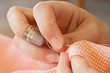 hands sewing hands sewing