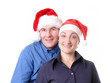 young couple in santa hats