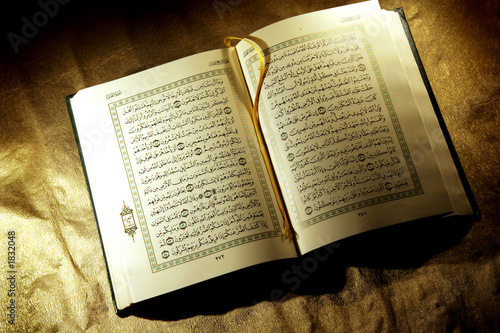 Photo: open holy koran book open holy koran book