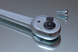 wrench on a reflecting surface