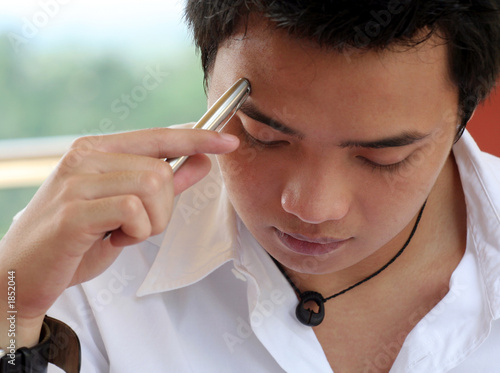 Photo: asian male thinking asian male thinking