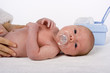 Photo: mother touching baby's skin mother touching baby's skin