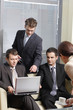 secretary serving cup of coffee to young business secretary serving cup of coffee to young business