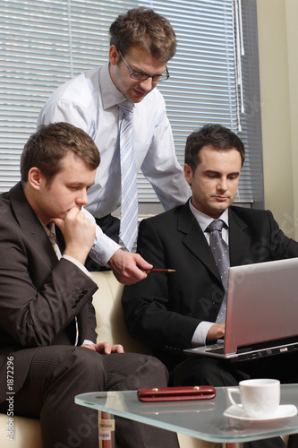 young business men working with latop in office