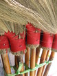 Brooms Bound in Red