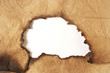 hole in grungy paper hole in grungy paper