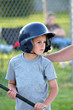 boy batting baseball