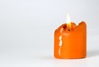 orange burning candle