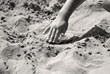 dessiner dans le sable
